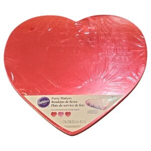 Elevate your celebrations with this set of 3 Wilton heart-shaped party platters